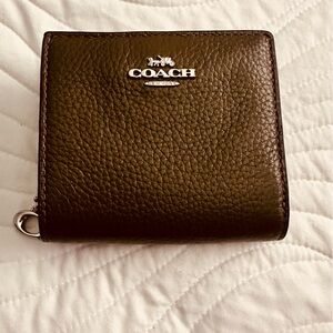 Coach small wallet. Dark green color. Barely used.